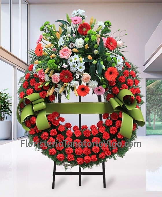Corona de flores funerarias claveles rojas